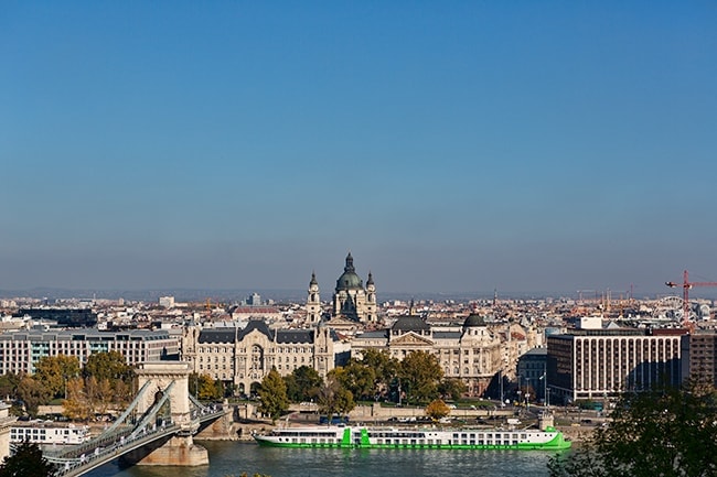 Behind the bridge is the Four Seasons Hotel Gresham Palace and on the right the Ministry of Interior or Belügyminisztérium