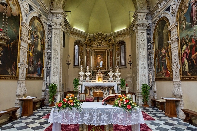 The famous fresco of the Madonna and Child behind the altar
